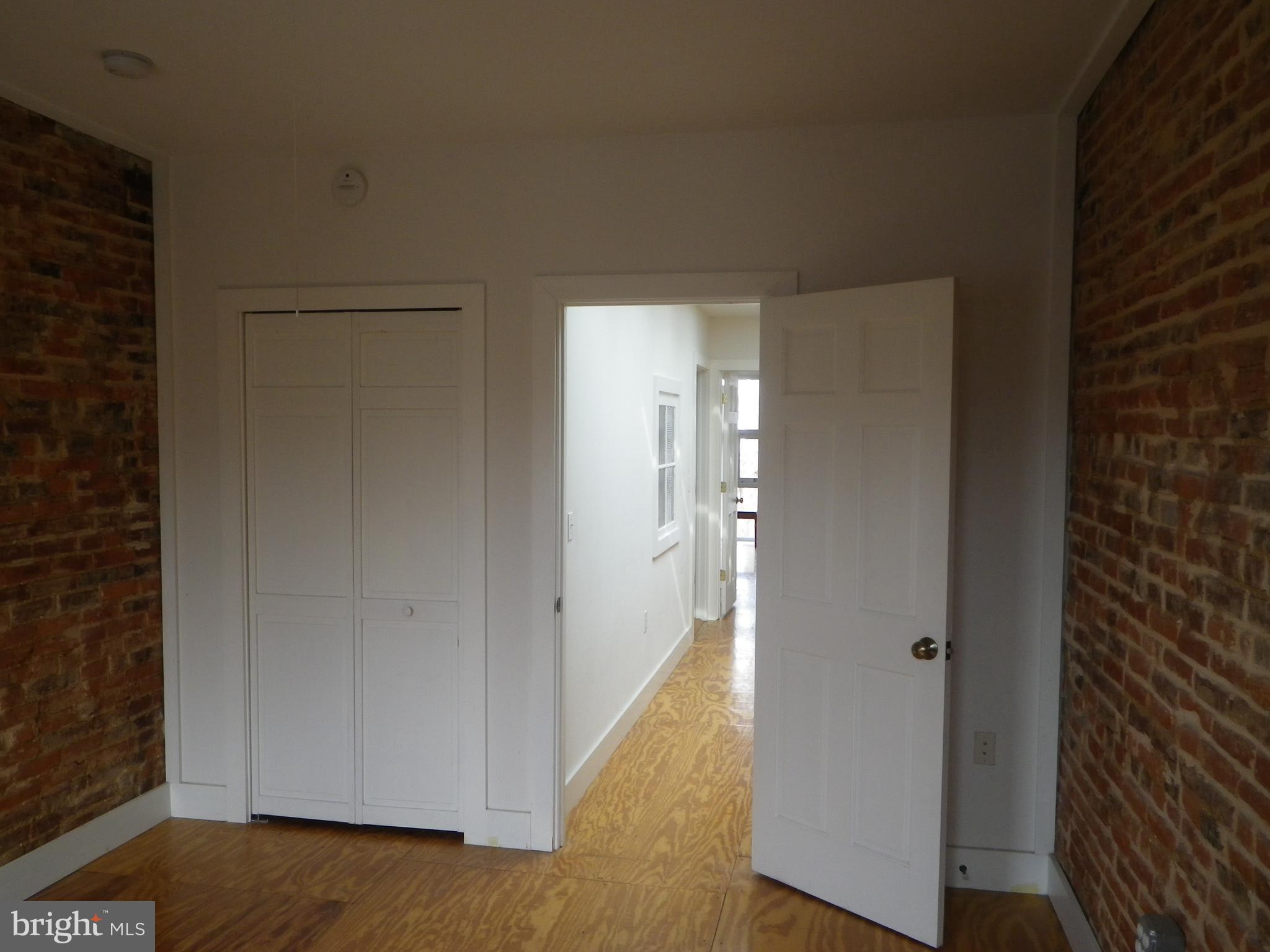523 Budd Street Philadelphia, PA 19104 - Photo 34 of 48 a view of a hallway with wooden floor