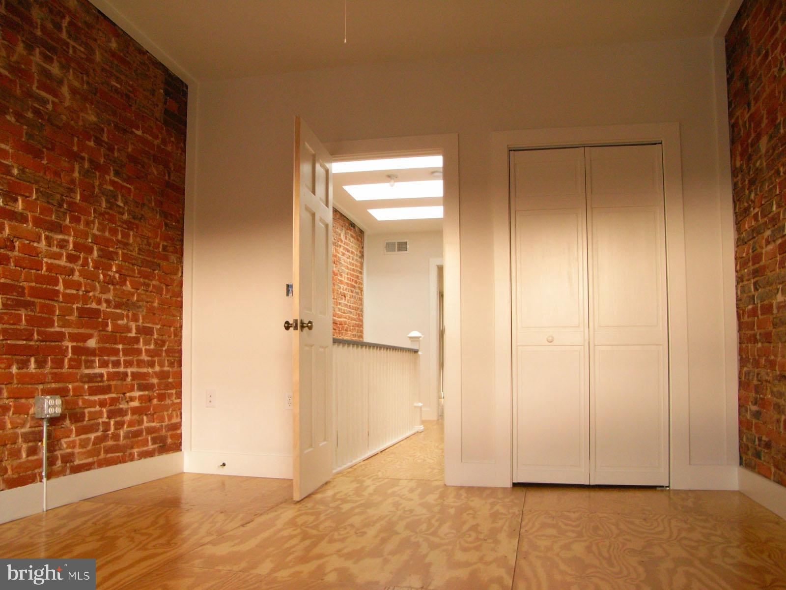 523 Budd Street Philadelphia, PA 19104 - Photo 35 of 48 a view of an empty room with wooden floor
