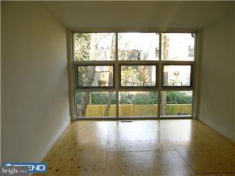 523 Budd Street Philadelphia, PA 19104 - Photo 36 of 48 a view of empty room with wooden floor