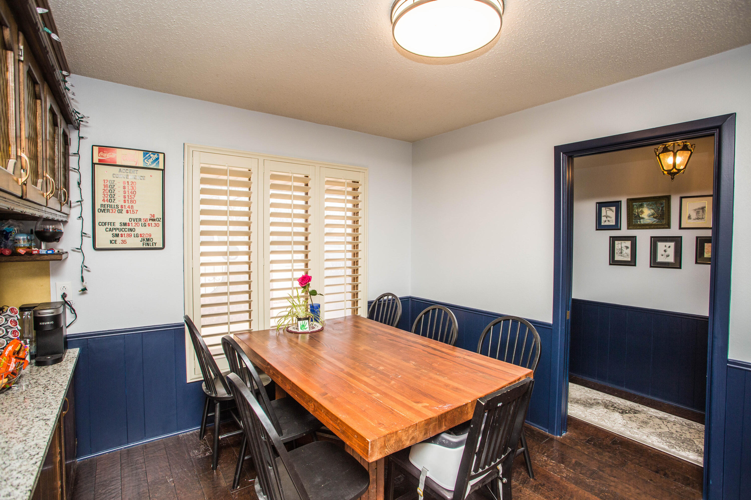 705 South 22nd Street Slaton, TX 79364 - Photo 5 of 30 a view of a dining room with furniture window and wooden floor