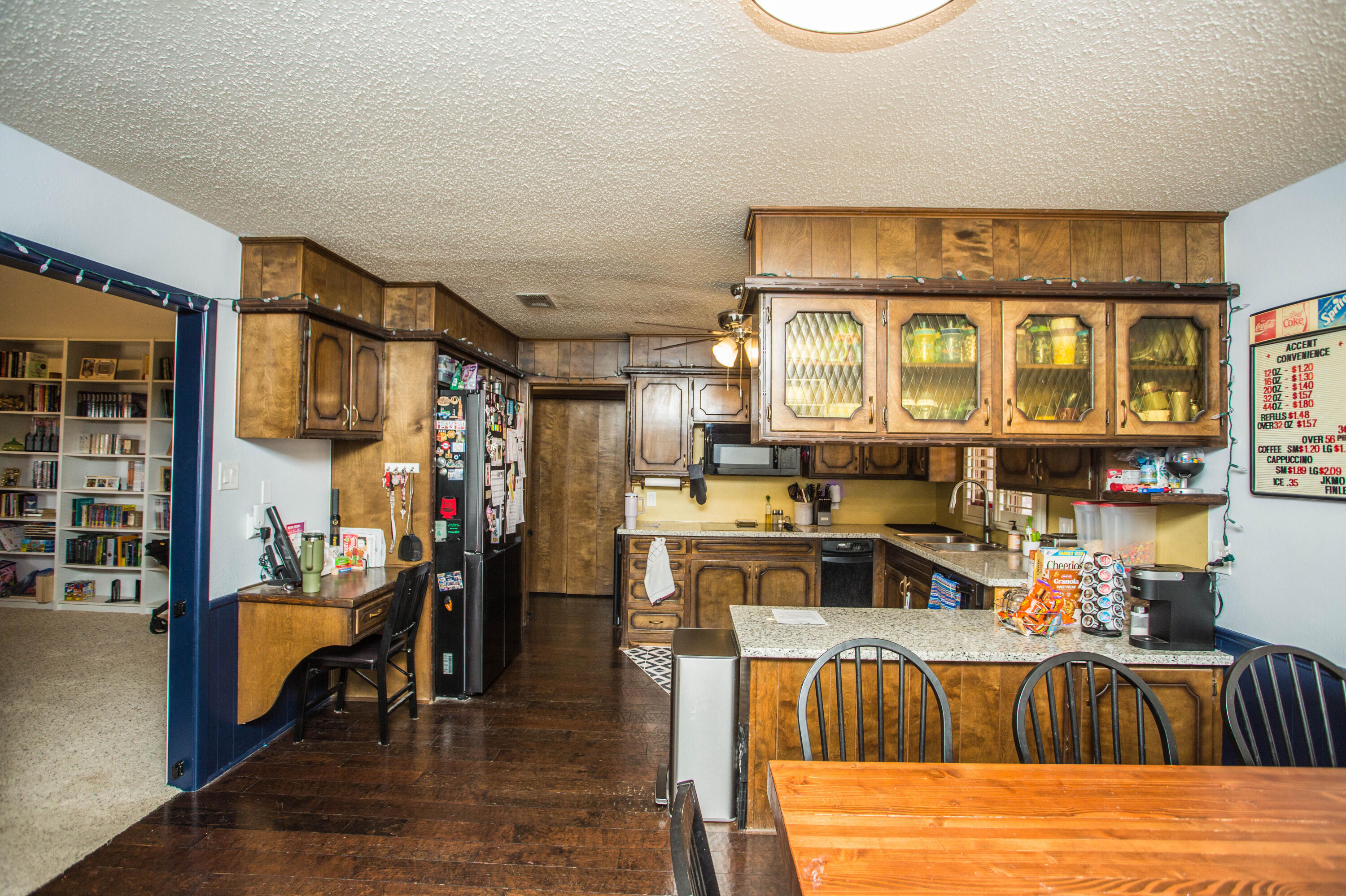 705 South 22nd Street Slaton, TX 79364 - Photo 8 of 30 a view of a living room and kitchen