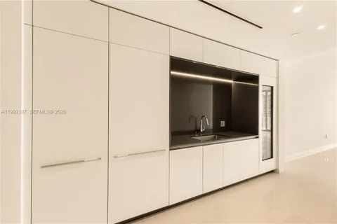 a view of a room that has a large window