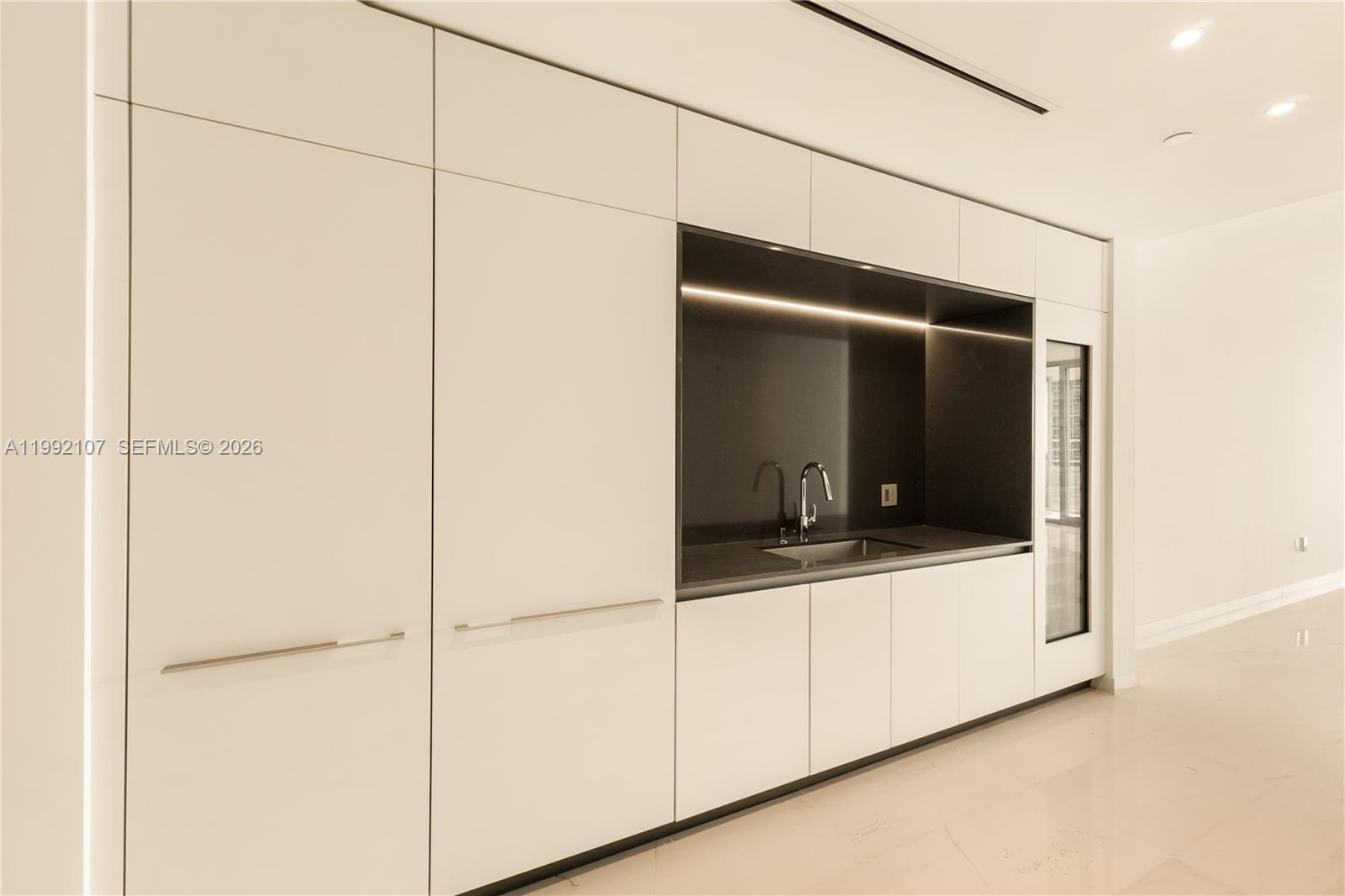 300 Biscayne Blvd Way, Unit 2103C Miami, FL 33131 - Photo 13 of 41 a view of a room that has a large window