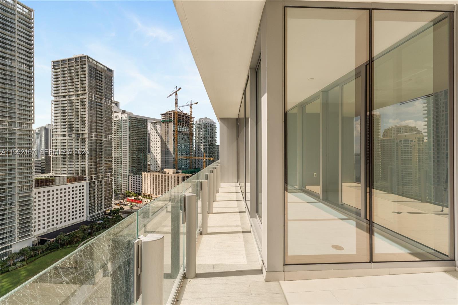 300 Biscayne Blvd Way, Unit 2103C Miami, FL 33131 - Photo 19 of 41 a view of balcony with glass door and glass door