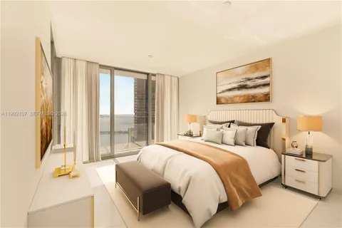 a spacious bedroom with a bed and a large window