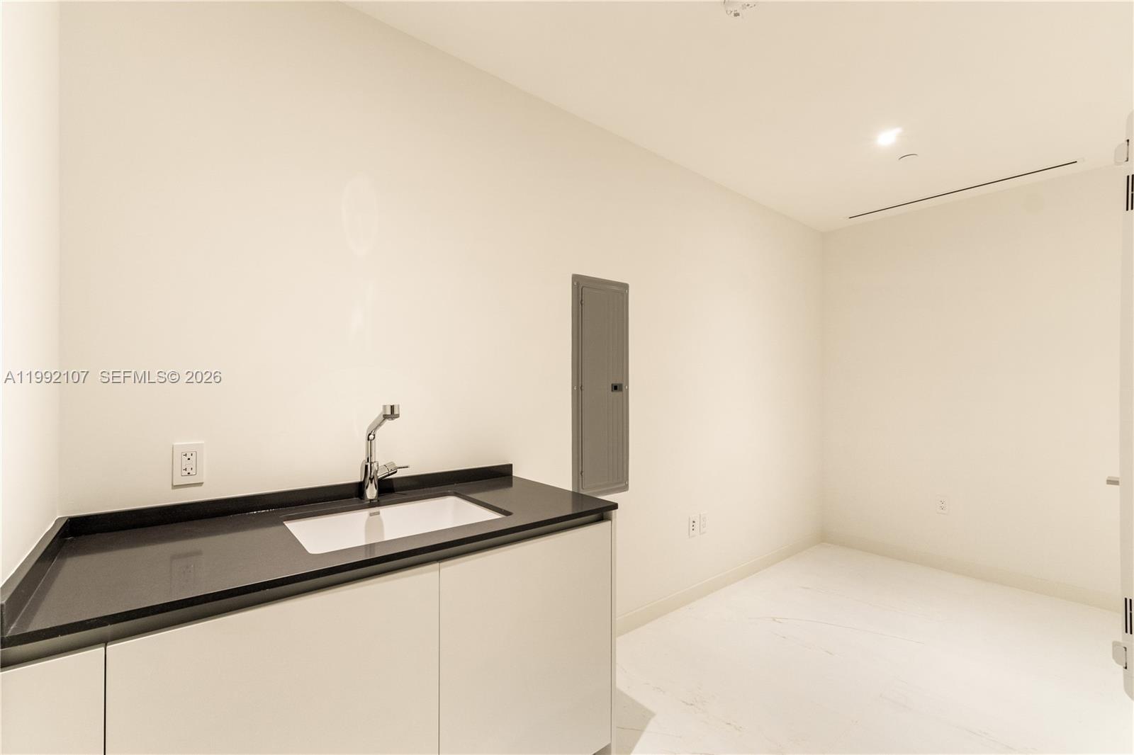 300 Biscayne Blvd Way, Unit 2103C Miami, FL 33131 - Photo 35 of 41 a bathroom with a sink and a mirror