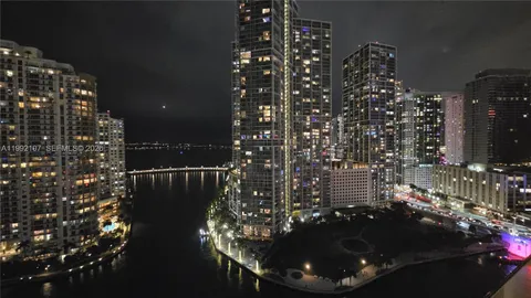 a view of a city with tall buildings