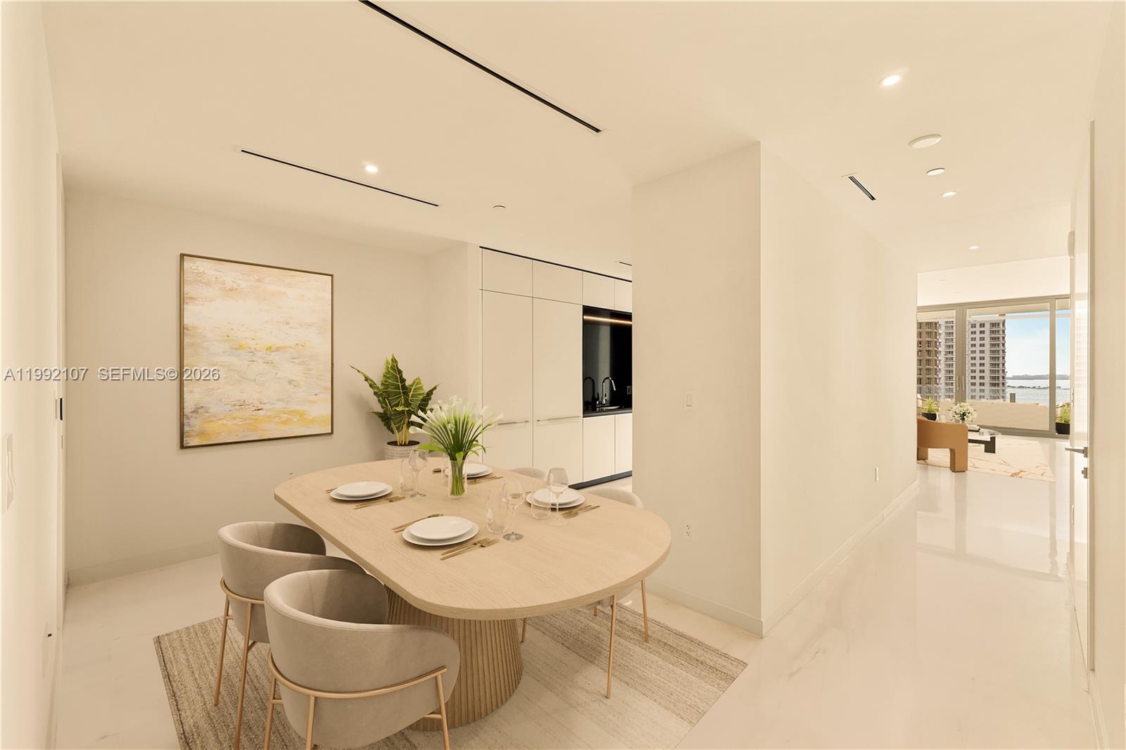 300 Biscayne Blvd Way, Unit 2103C Miami, FL 33131 - Photo 9 of 41 a view of a dining room with furniture and wooden floor