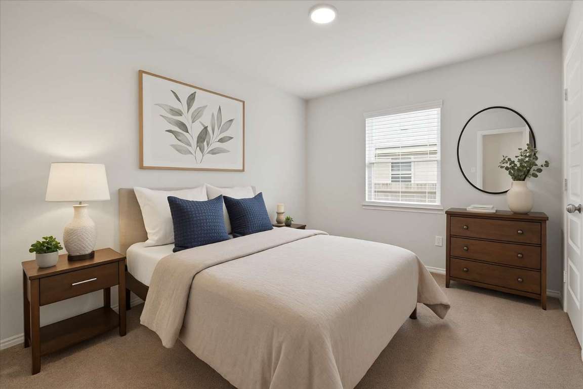 271 Eclipse Drive Austin, TX 78737 - Photo 21 of 39 a bedroom with a bed and a window