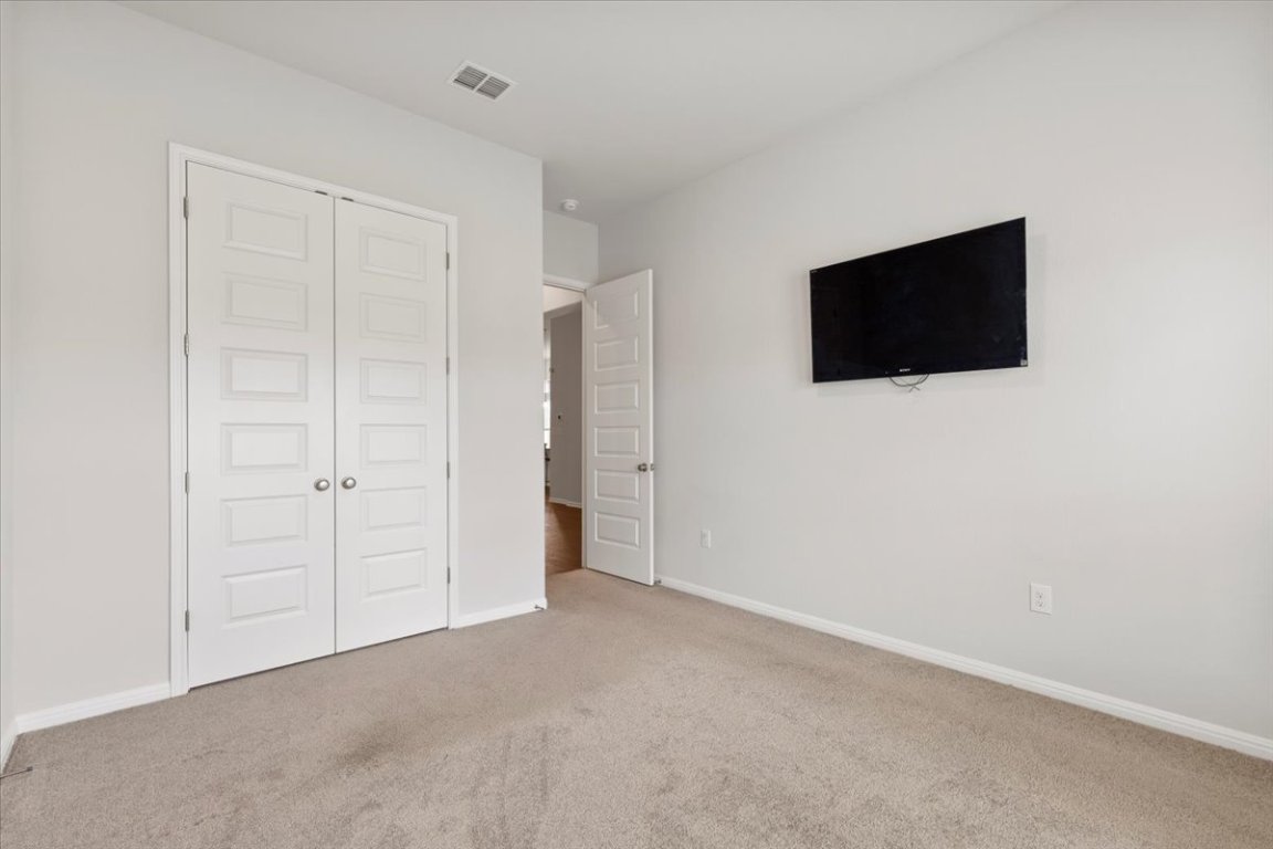 271 Eclipse Drive Austin, TX 78737 - Photo 24 of 39 a view of a livingroom with an empty space
