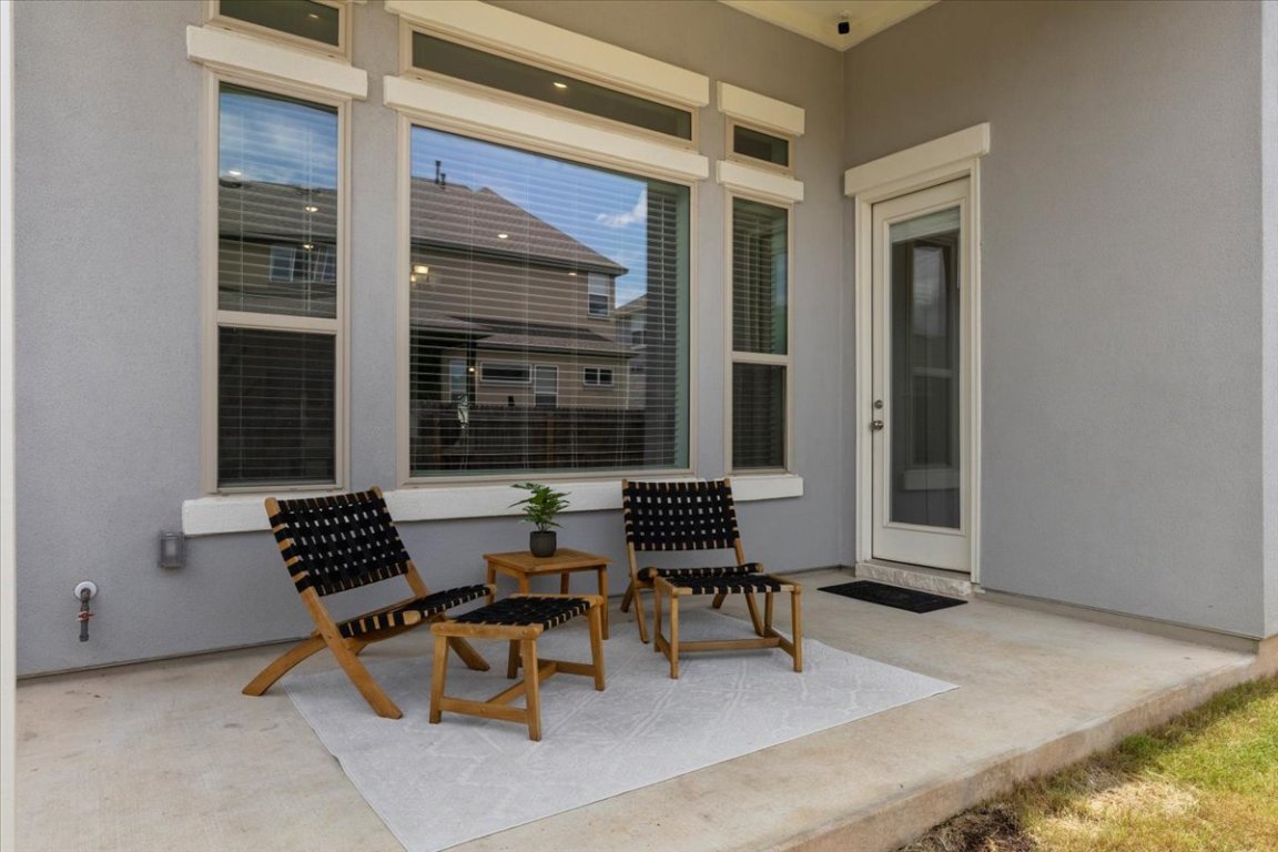 271 Eclipse Drive Austin, TX 78737 - Photo 29 of 39 a outdoor space with a couch and a window