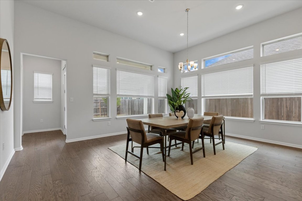271 Eclipse Drive Austin, TX 78737 - Photo 9 of 39 a view of a dining room with furniture and window