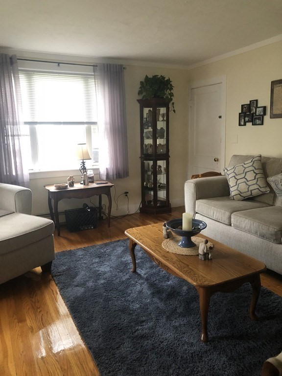 14 Racicot Avenue Webster, MA 01570 - Photo 6 of 12 a living room with furniture and a window