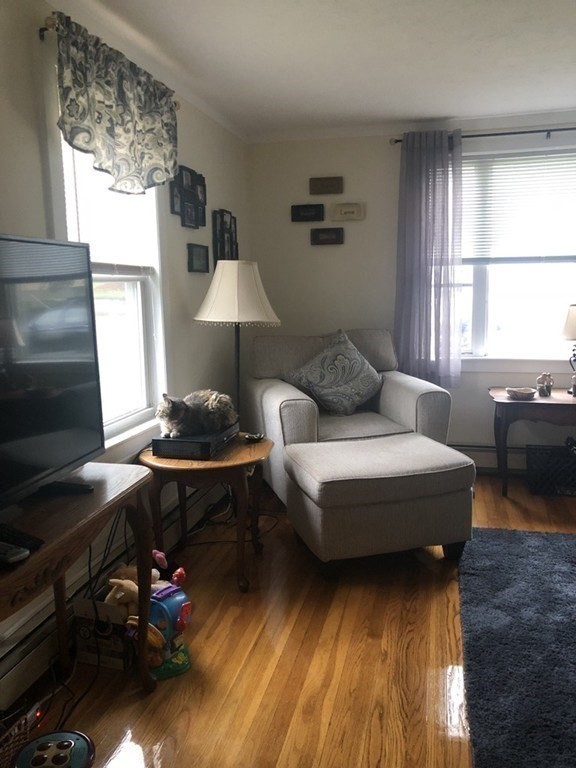 14 Racicot Avenue Webster, MA 01570 - Photo 7 of 12 a living room with furniture and a window