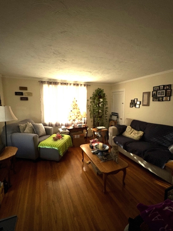 14 Racicot Avenue Webster, MA 01570 - Photo 10 of 12 a living room with furniture and wooden floor