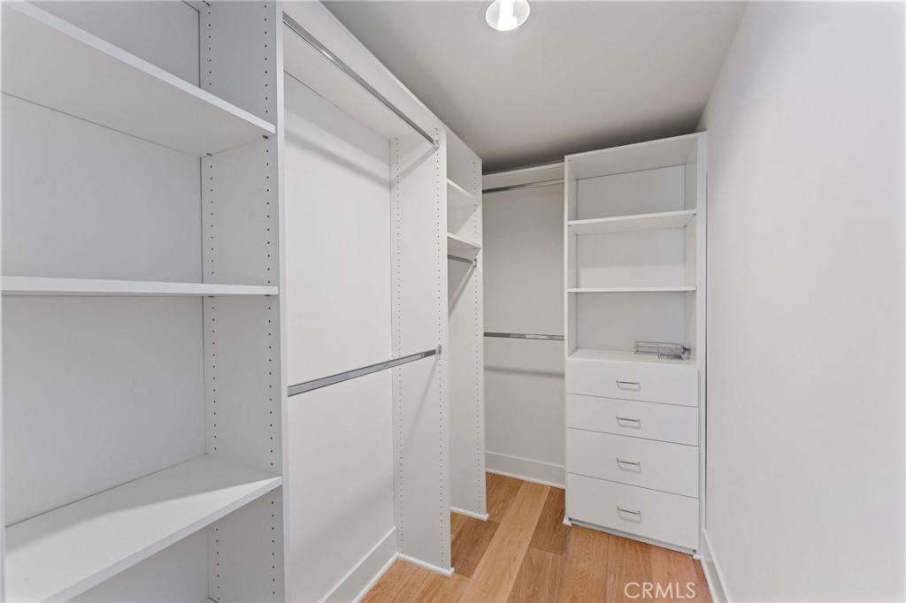 118 North Kings Road, Unit 201 Los Angeles, CA 90048 - Photo 27 of 38 a view of walk in closet with empty racks