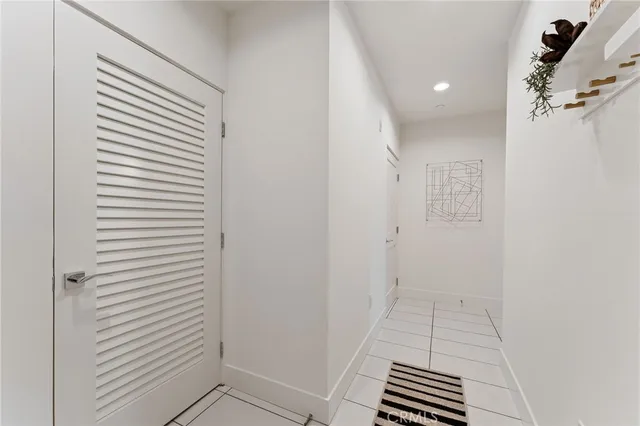 a view of an entryway with a fan