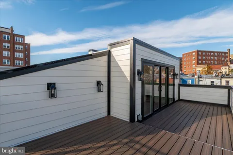 a view of a balcony from entryway