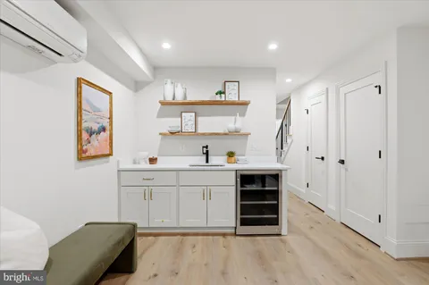 a view of cabinets a sink and a window