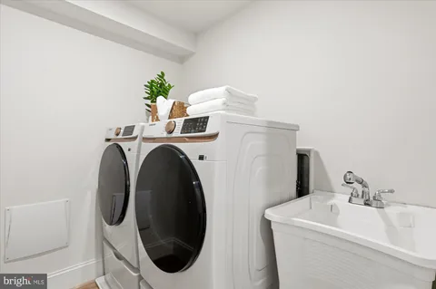 a bathroom with a sink and toilet