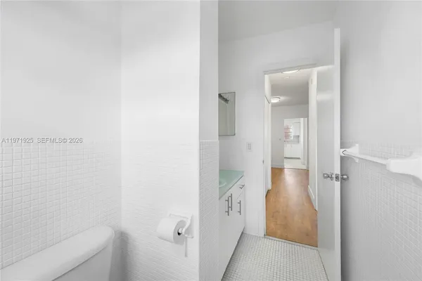 a bathroom with a shower and a toilet