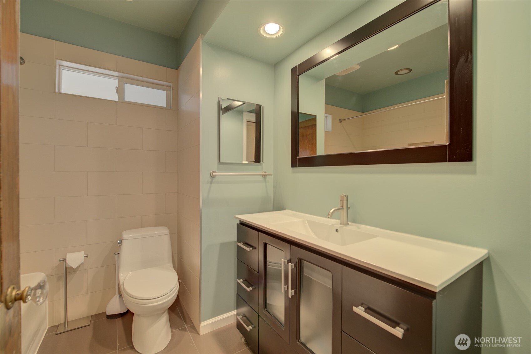 357 29th Avenue Seattle, WA 98122 - Photo 19 of 31 a bathroom with a sink vanity and toilet