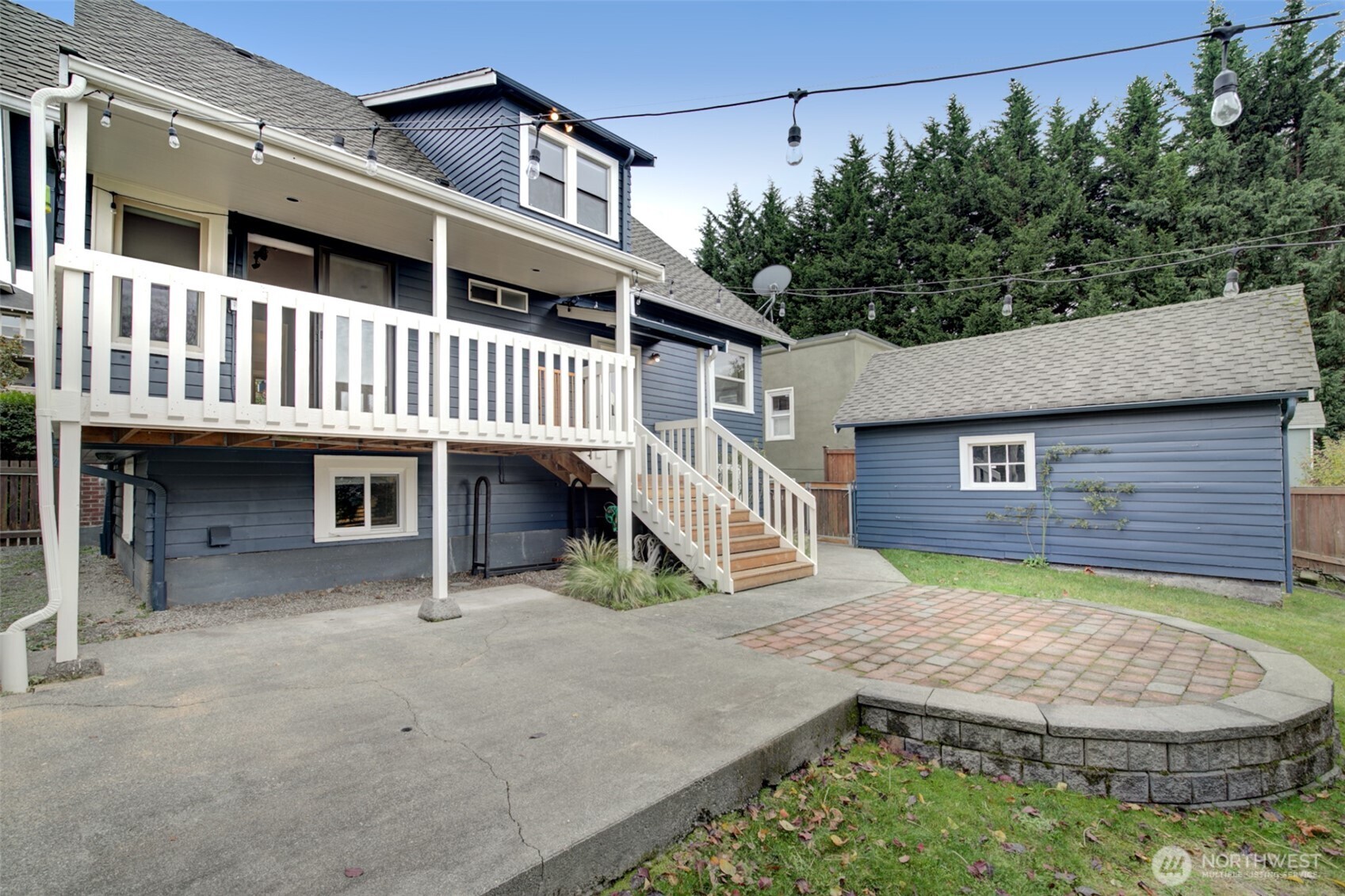 357 29th Avenue Seattle, WA 98122 - Photo 28 of 31 a view of a house with a patio and a yard