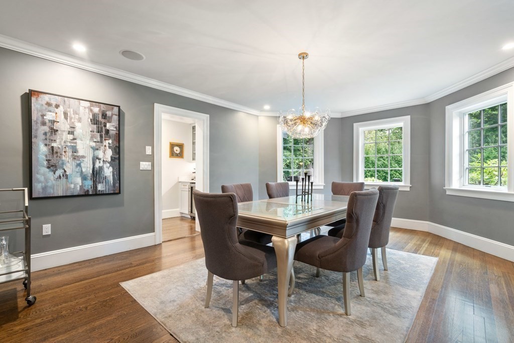 52 Hammondswood Road Newton, MA 02467 - Photo 11 of 34 a view of a dining room with furniture window and wooden floor