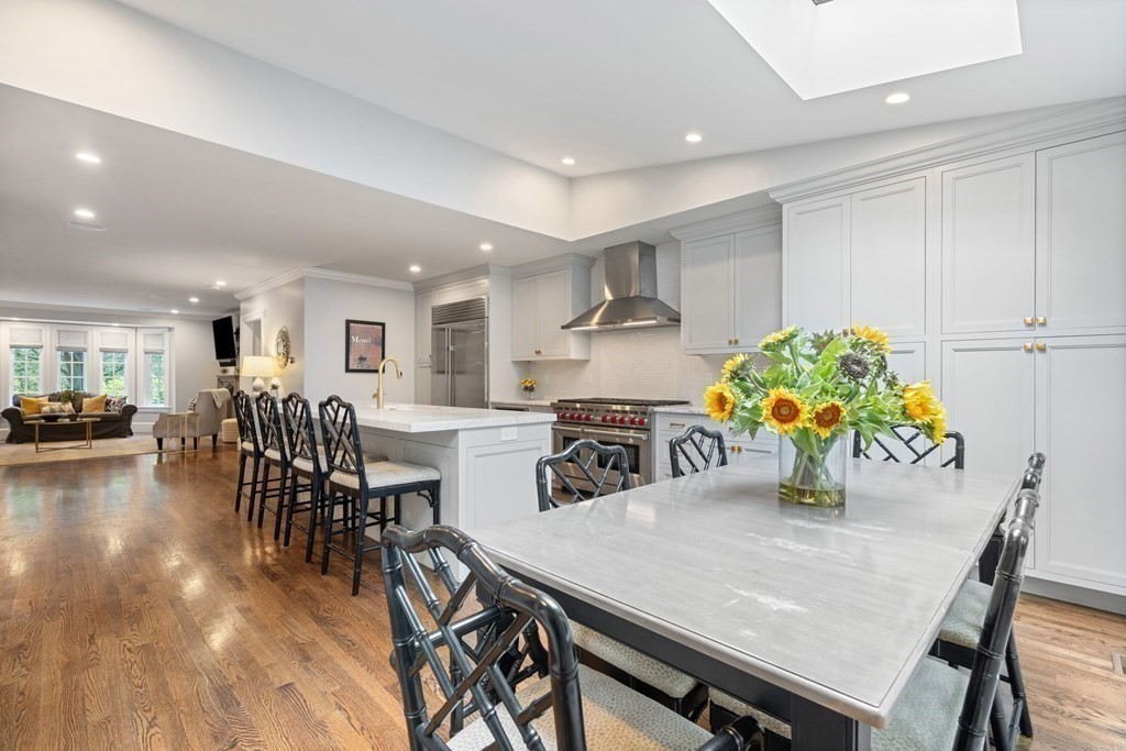 52 Hammondswood Road Newton, MA 02467 - Photo 2 of 34 a kitchen with a table and chairs