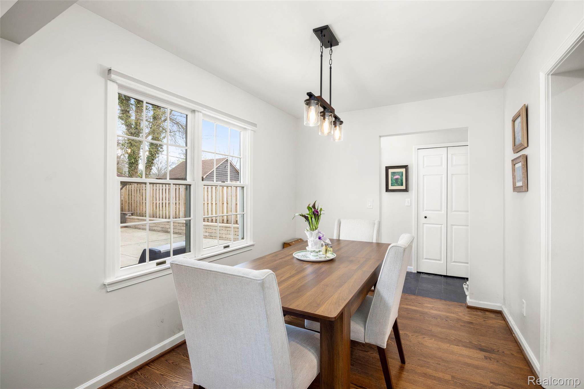 244 Kerby Road Grosse Pointe, MI 48236 - Photo 16 of 53 Dining room featuring baseboards and dark wood-style floors