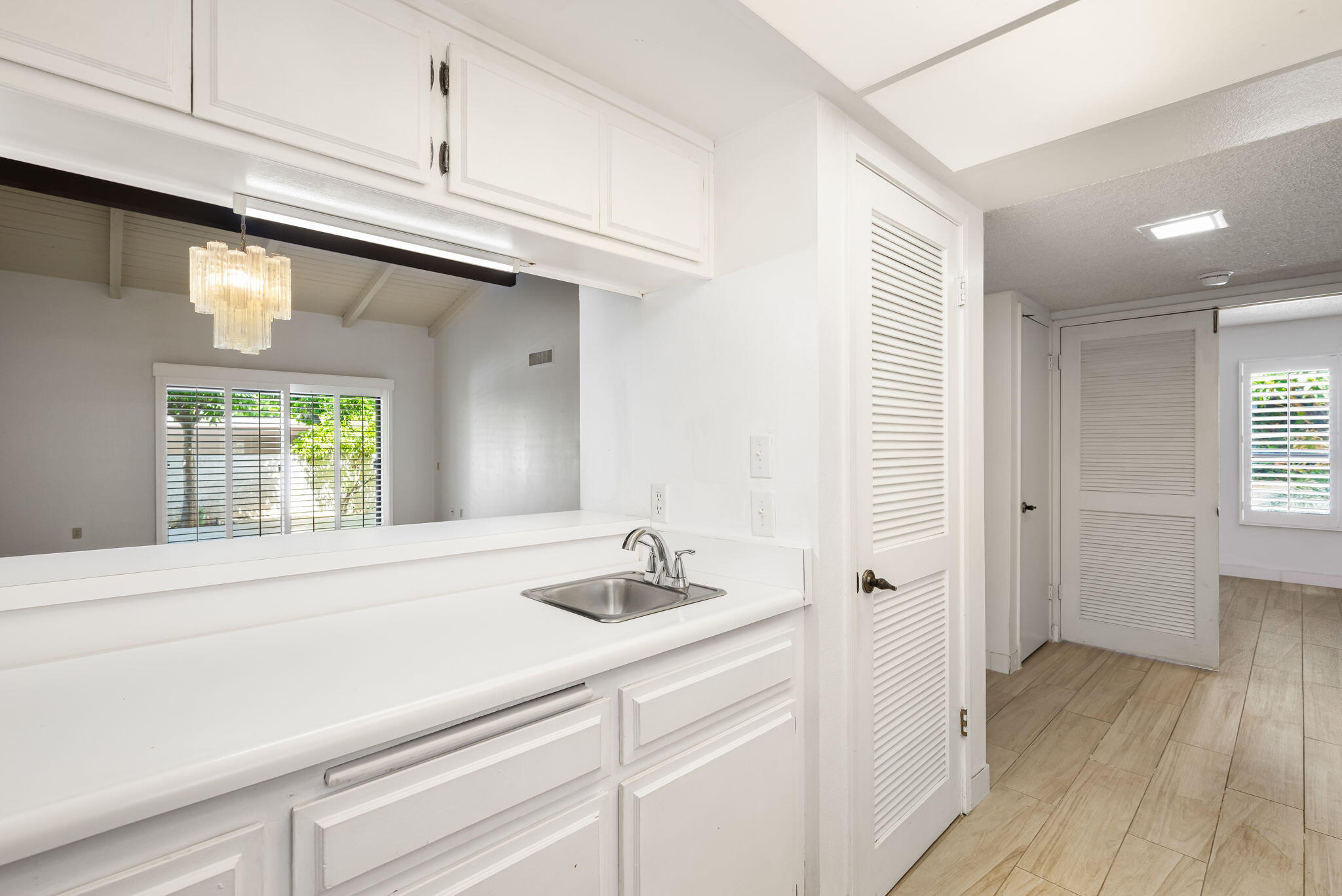 1150 East Palm Canyon Drive, Unit 37 Palm Springs, CA 92264 - Photo 15 of 40 a bathroom with a sink and a window