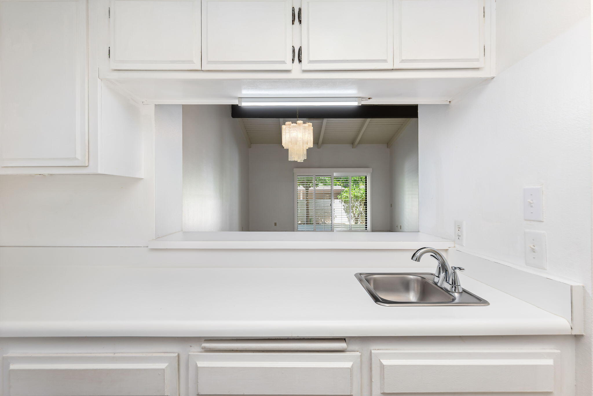 1150 East Palm Canyon Drive, Unit 37 Palm Springs, CA 92264 - Photo 16 of 40 a close view of sink and tap
