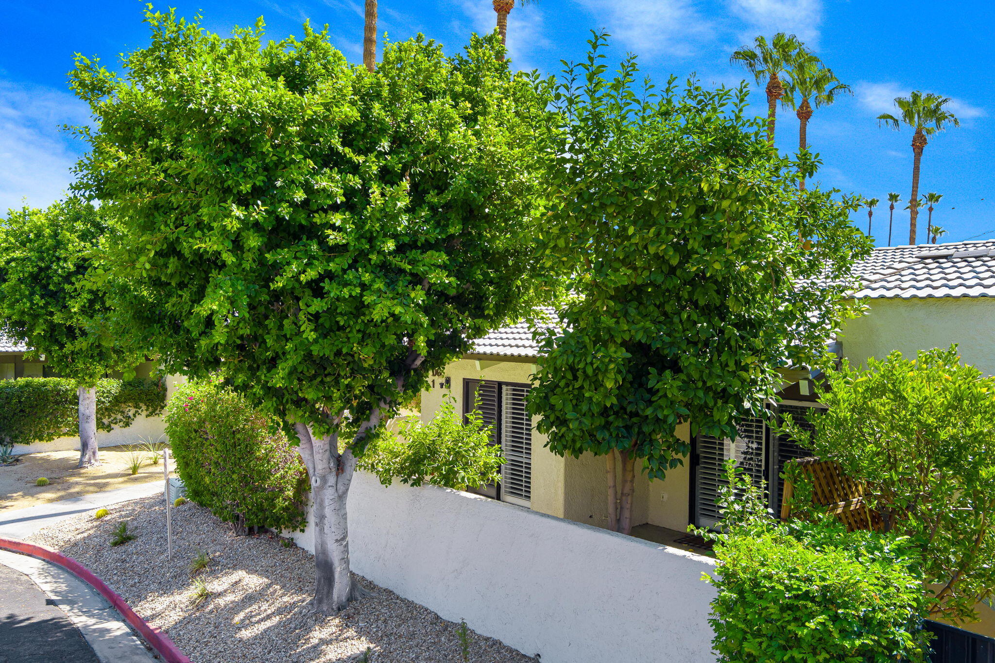 1150 East Palm Canyon Drive, Unit 37 Palm Springs, CA 92264 - Photo 4 of 40 a view of a house with balcony