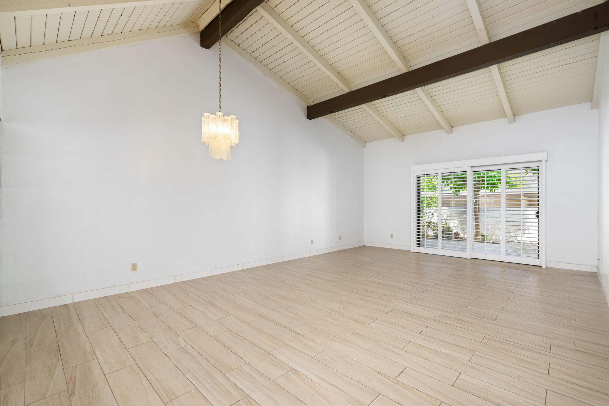 1150 East Palm Canyon Drive, Unit 37 Palm Springs, CA 92264 - Photo 8 of 40 a view of an empty room with a window