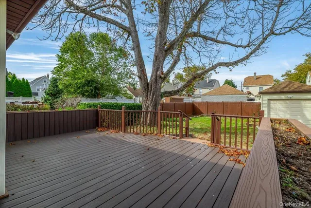 a balcony with wooden floor