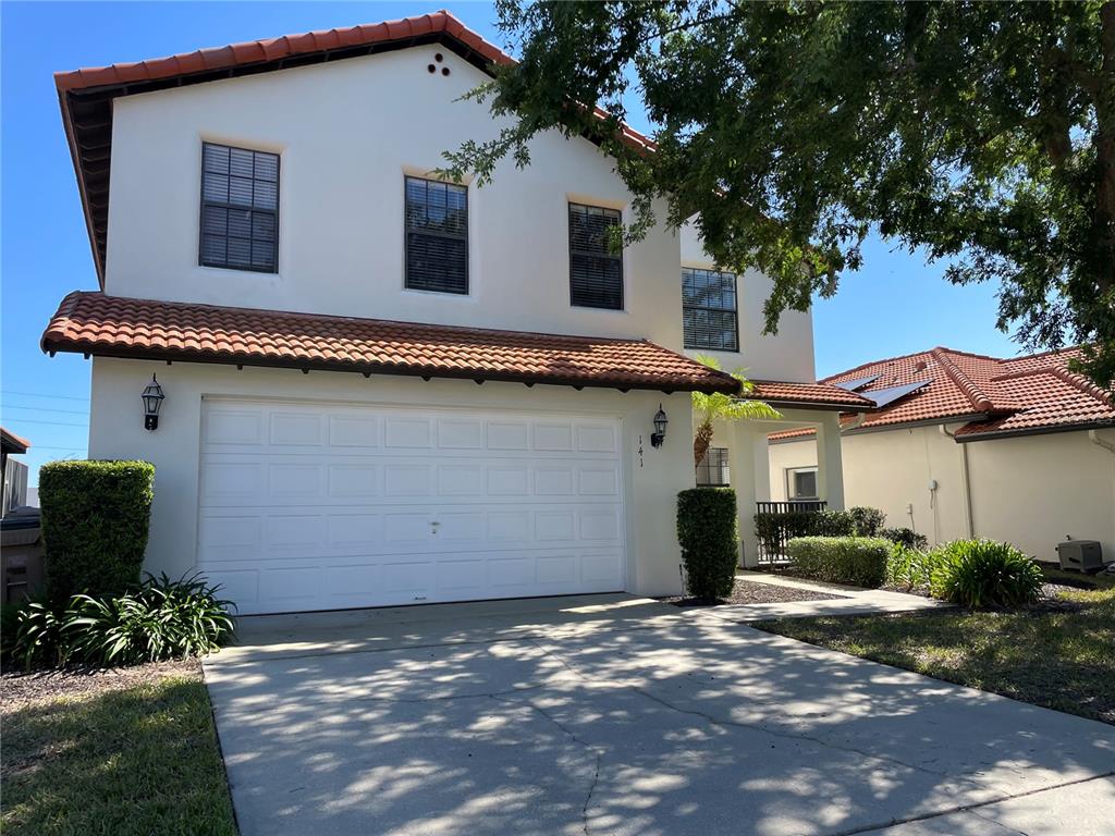 141 Summer Pl Loop Clermont, FL 34714 - Photo 3 of 63 a view of a house with a yard