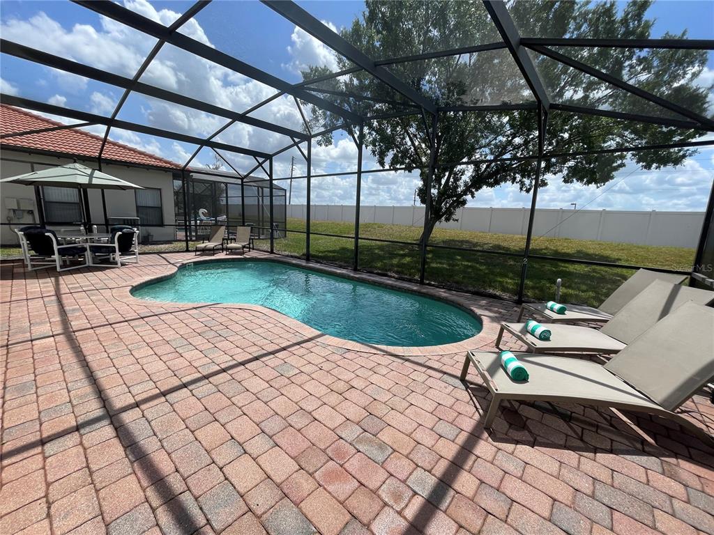 141 Summer Pl Loop Clermont, FL 34714 - Photo 45 of 63 a view of swimming pool with a patio