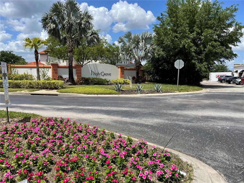 141 Summer Pl Loop Clermont, FL 34714 - Photo 50 of 63 a front view of a house with a yard and fountain
