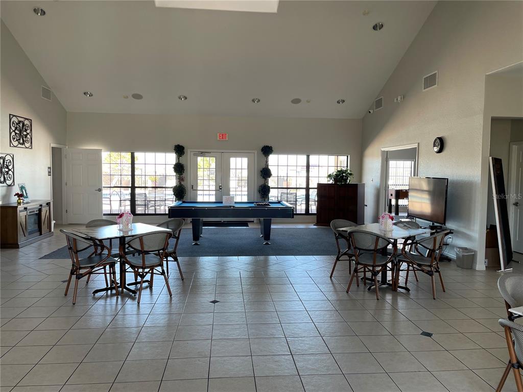 141 Summer Pl Loop Clermont, FL 34714 - Photo 53 of 63 a view of a dining hall with furniture