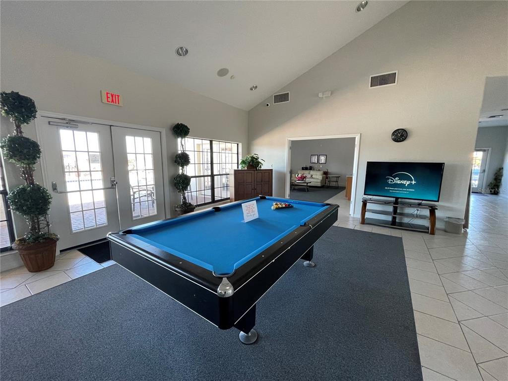 141 Summer Pl Loop Clermont, FL 34714 - Photo 56 of 63 a room with pool table and windows