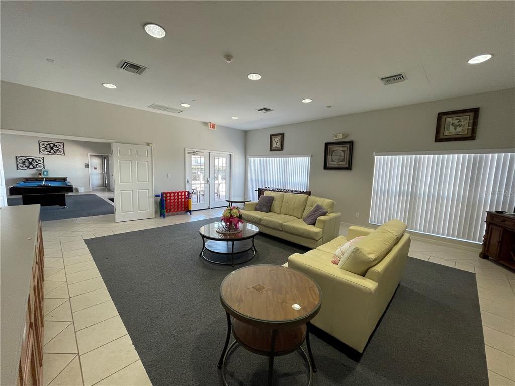 141 Summer Pl Loop Clermont, FL 34714 - Photo 58 of 63 a living room with furniture and a couch