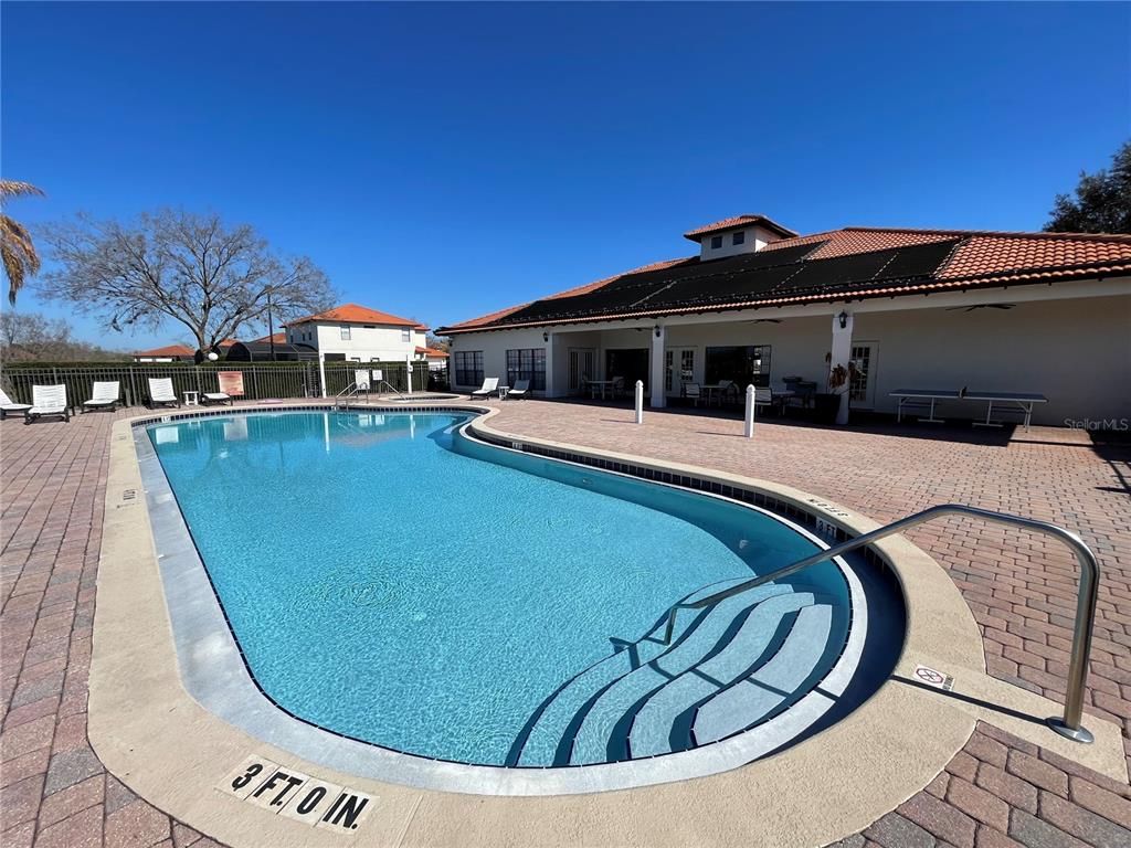 141 Summer Pl Loop Clermont, FL 34714 - Photo 61 of 63 a view of a house with swimming pool