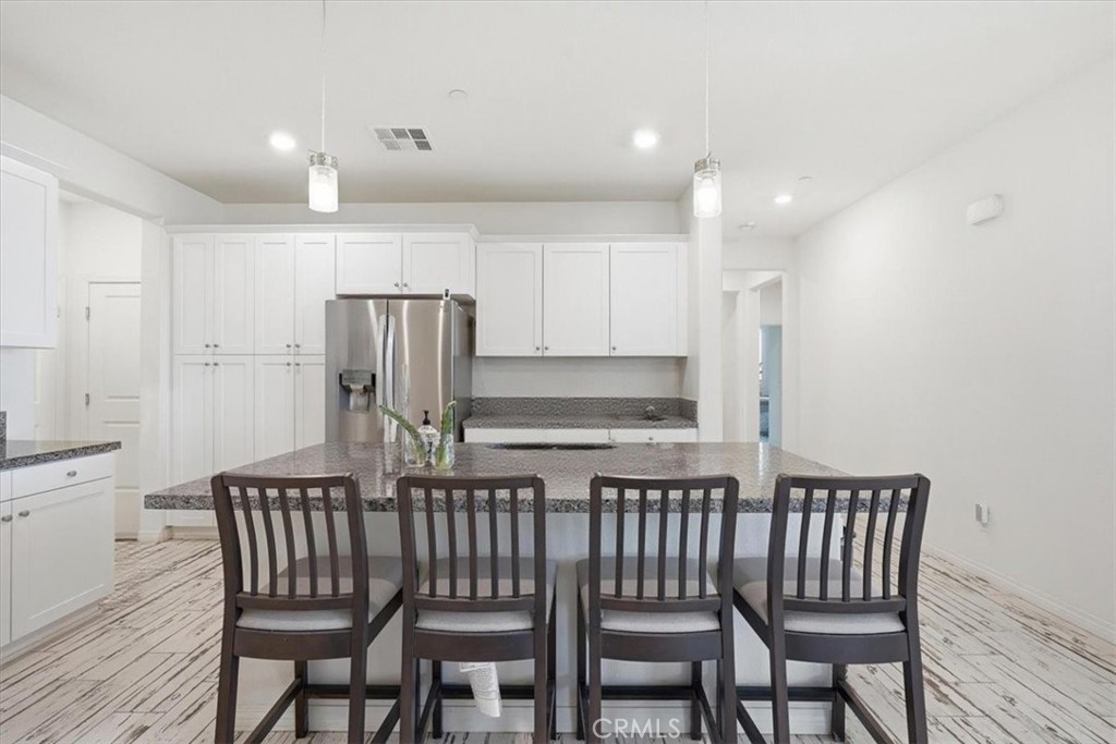 32350 Iron Trail Road Winchester, CA 92596 - Photo 9 of 32 a view of a dining room with furniture