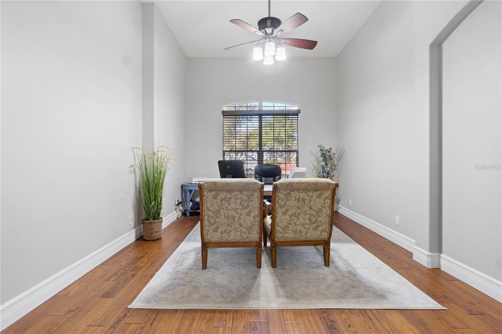 3108 Carter Jones Road Groveland, FL 34736 - Photo 28 of 54 a living room with furniture and a window