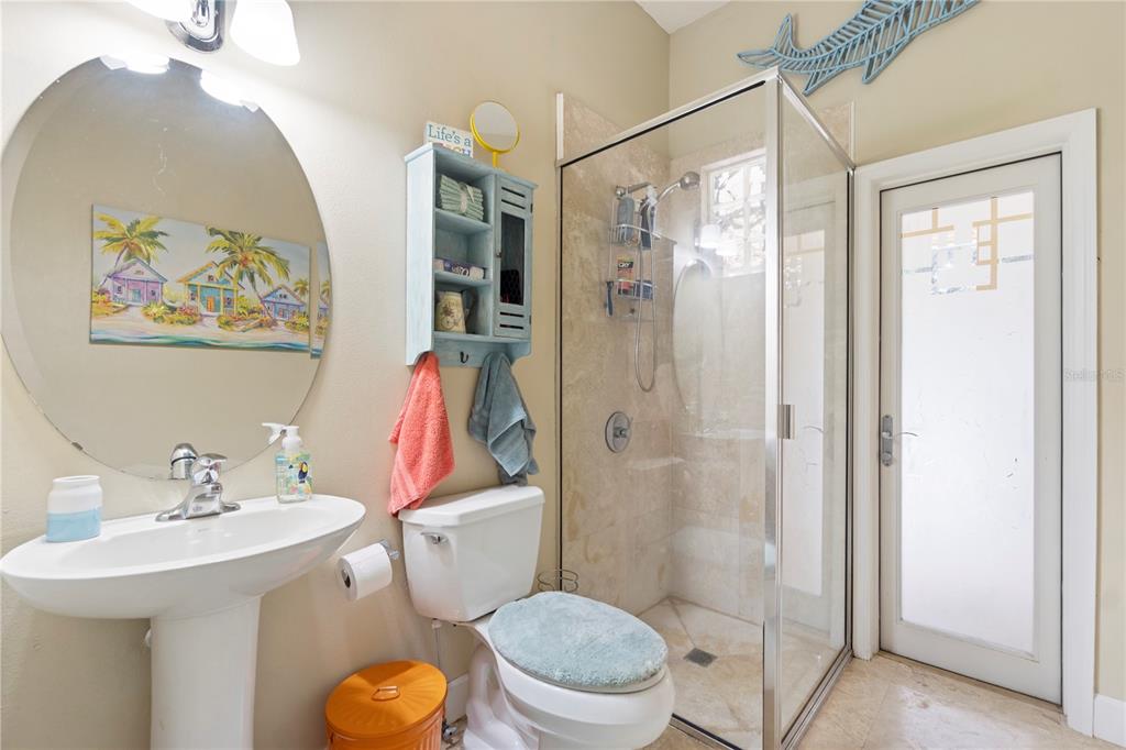 3108 Carter Jones Road Groveland, FL 34736 - Photo 31 of 54 a bathroom with a sink toilet and shower