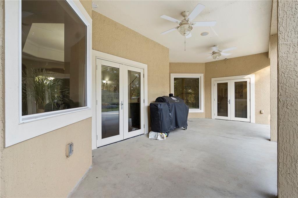 3108 Carter Jones Road Groveland, FL 34736 - Photo 39 of 54 a living room with furniture and a window