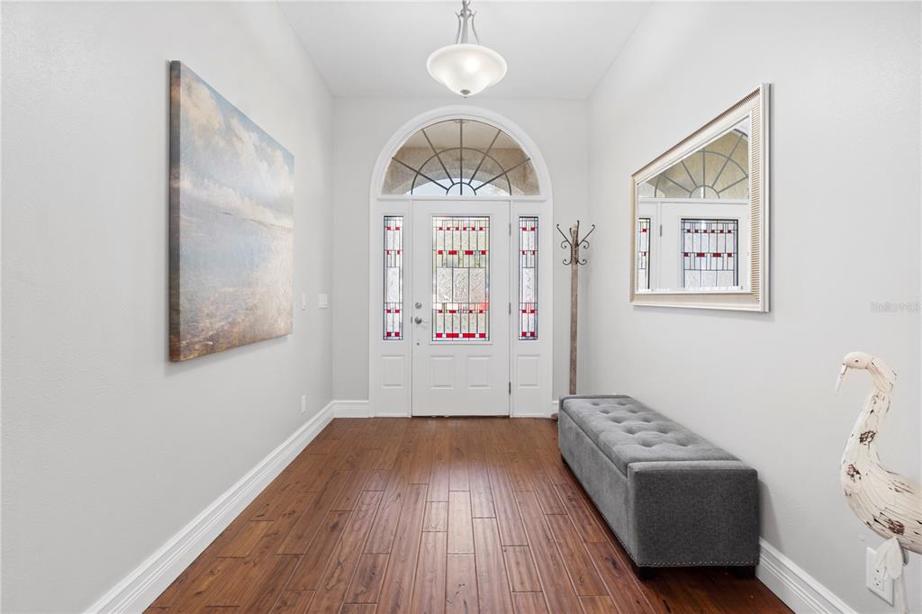 3108 Carter Jones Road Groveland, FL 34736 - Photo 7 of 54 a view of livingroom with furniture and wooden floor