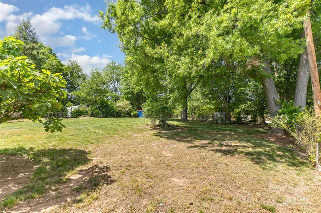 a view of a yard with an outdoor space