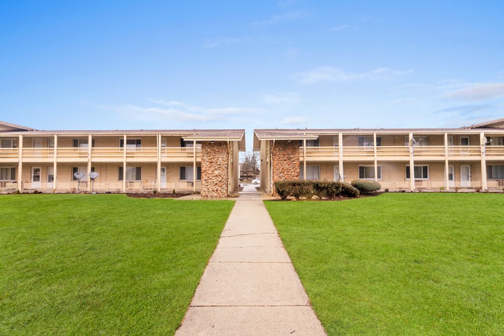14501 Keystone Avenue, Unit 12 Midlothian, IL 60445 - Photo 1 of 11 a view of a house with garden