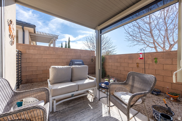 4708 Martin Drive St. George, UT 84790 - Photo 24 of 28 Fenced backyard with a patio and an outdoor hangout area